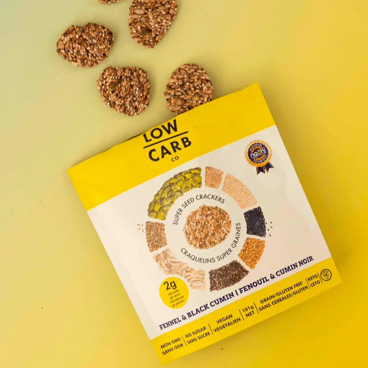 Fennel and Black Cumin spices in a glass jar from The Low Carb Co, showcasing rich textures and earthy colors.