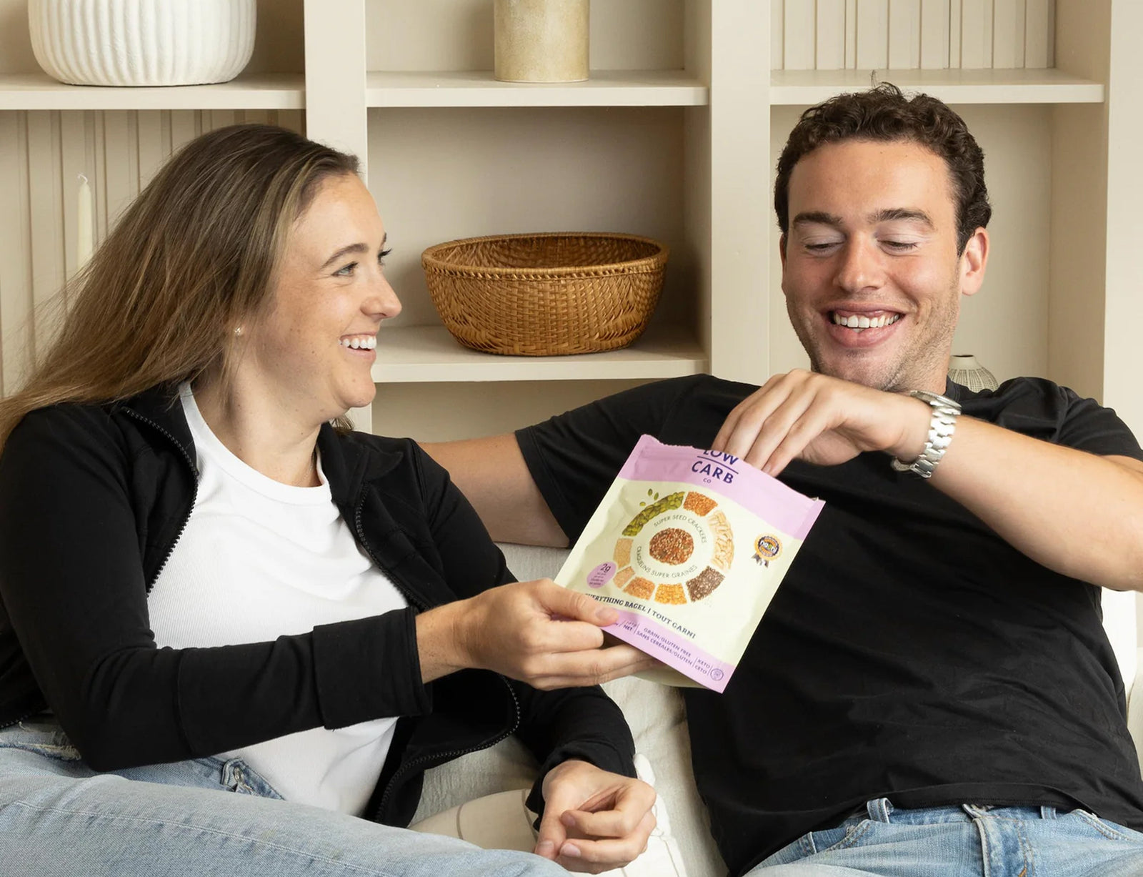 Jack, founder of The Low Carb Co, sharing a bag of seed crackers