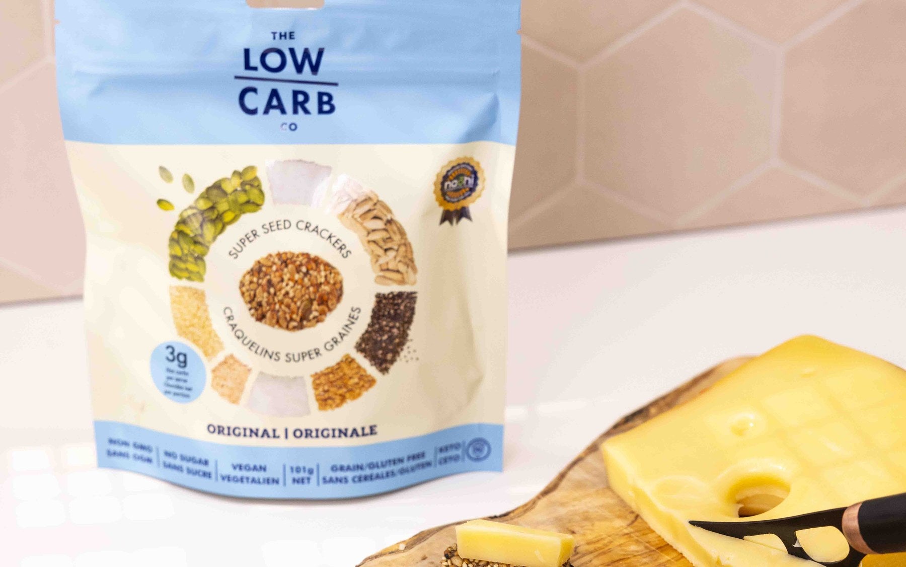 Original Low Carb Co crackers with cheese on a charcuterie board