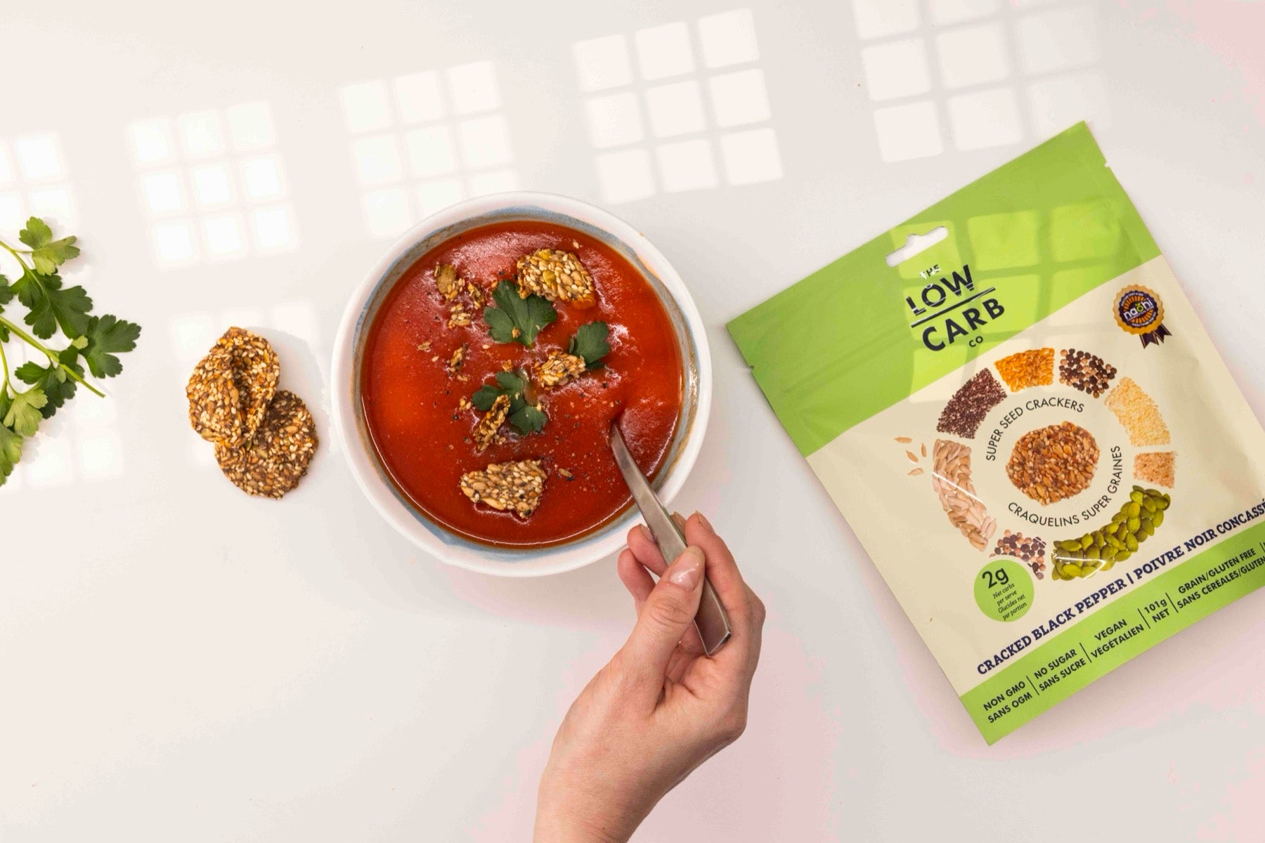 The Low Carb Co crackers beside tomato soup